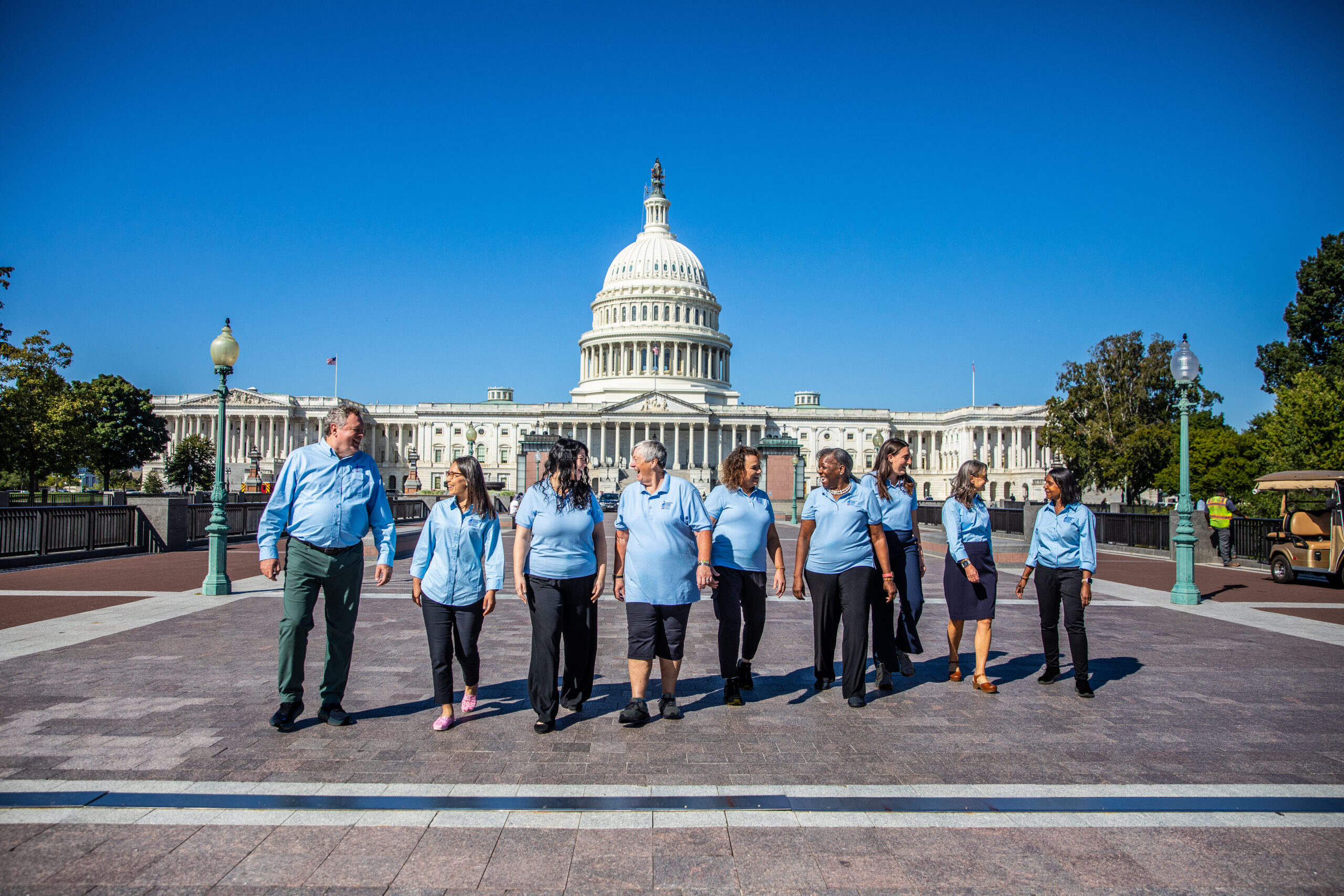 volunteers walking in front of the Capitol