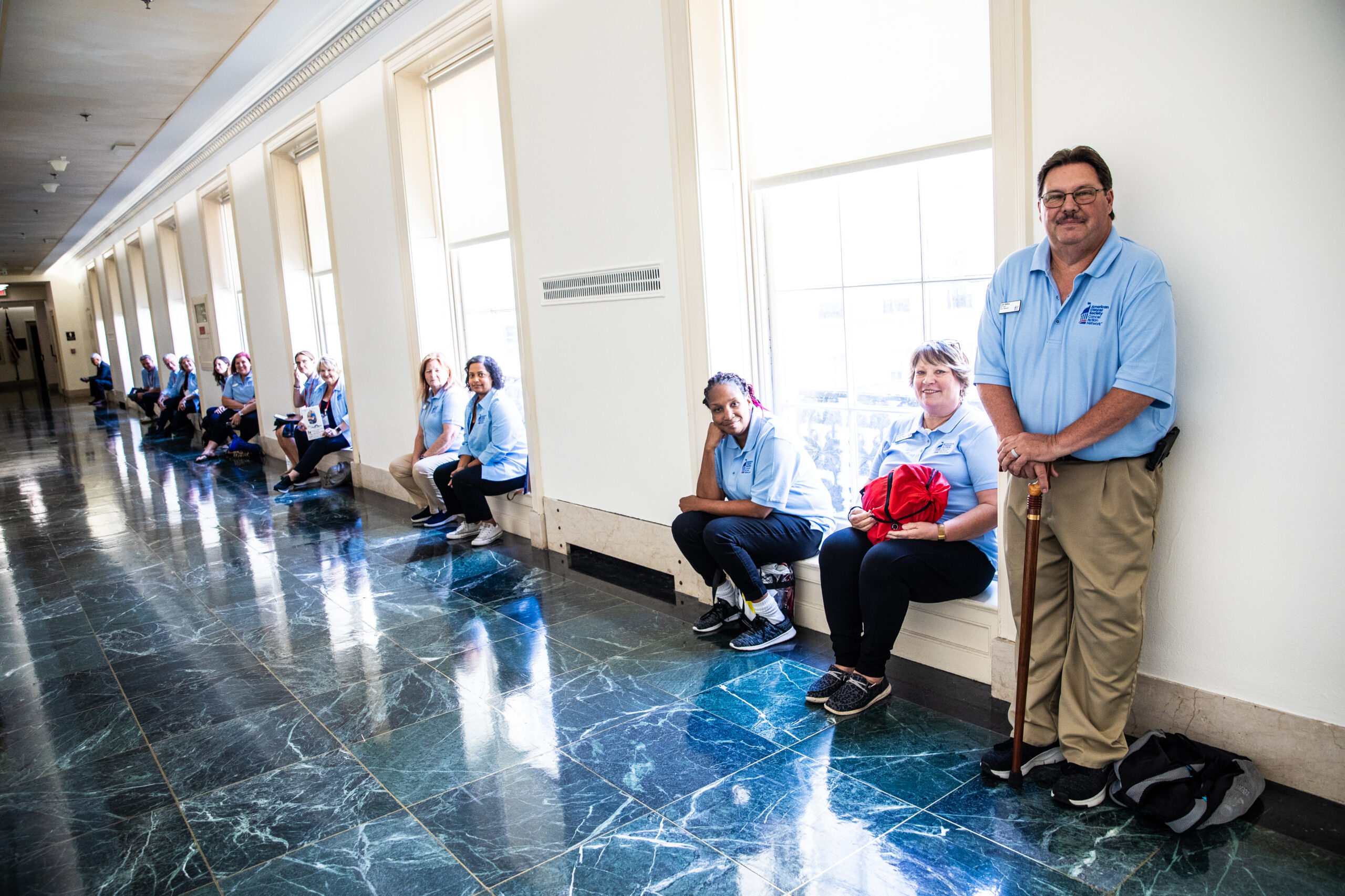volunteers waiting inside the Capitol