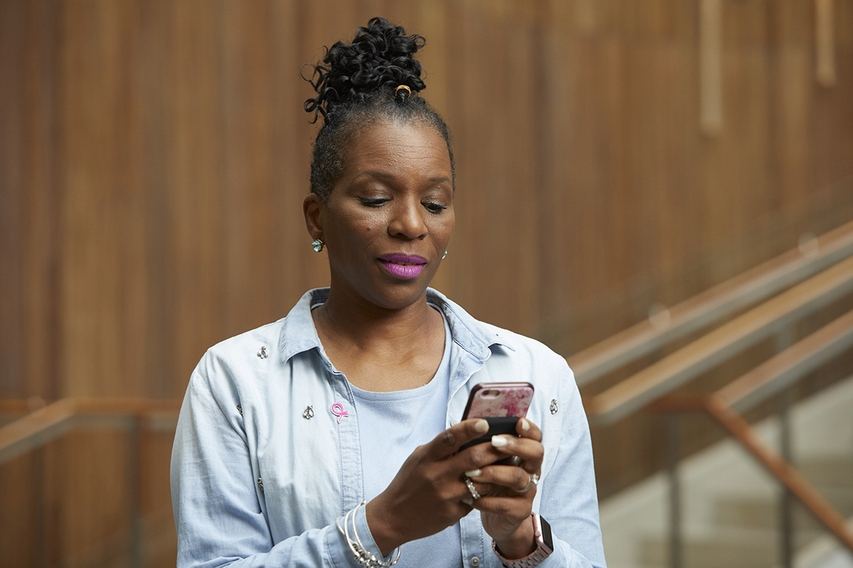 Woman hold a mobile phone