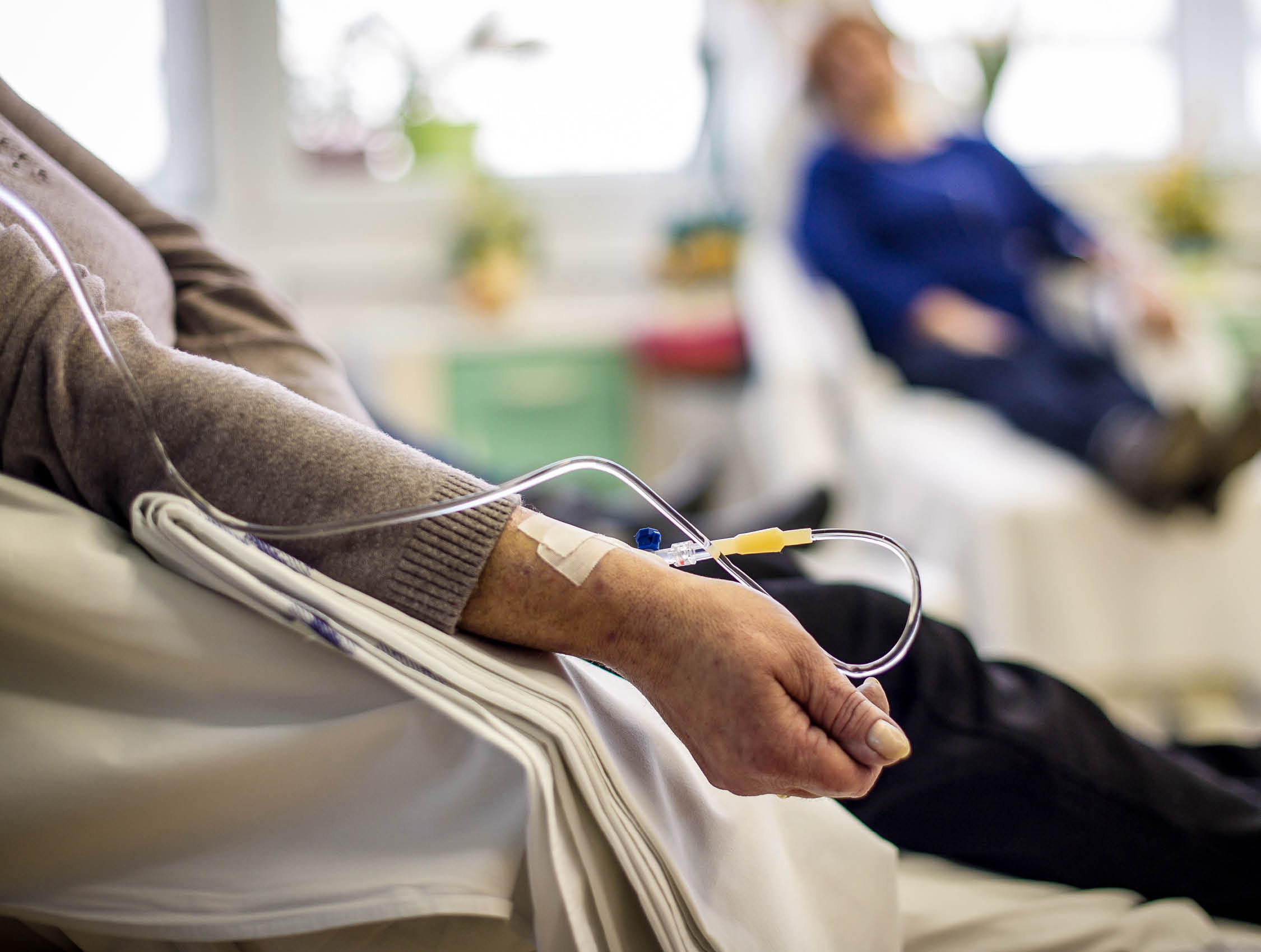 Cancer patients receiving chemotherapy treatment in a hospital