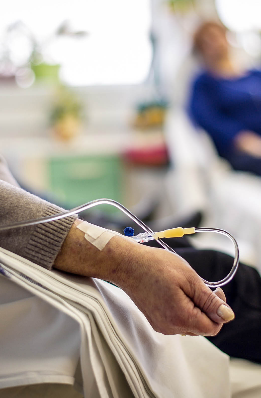 Cancer patients receiving chemotherapy treatment in a hospital