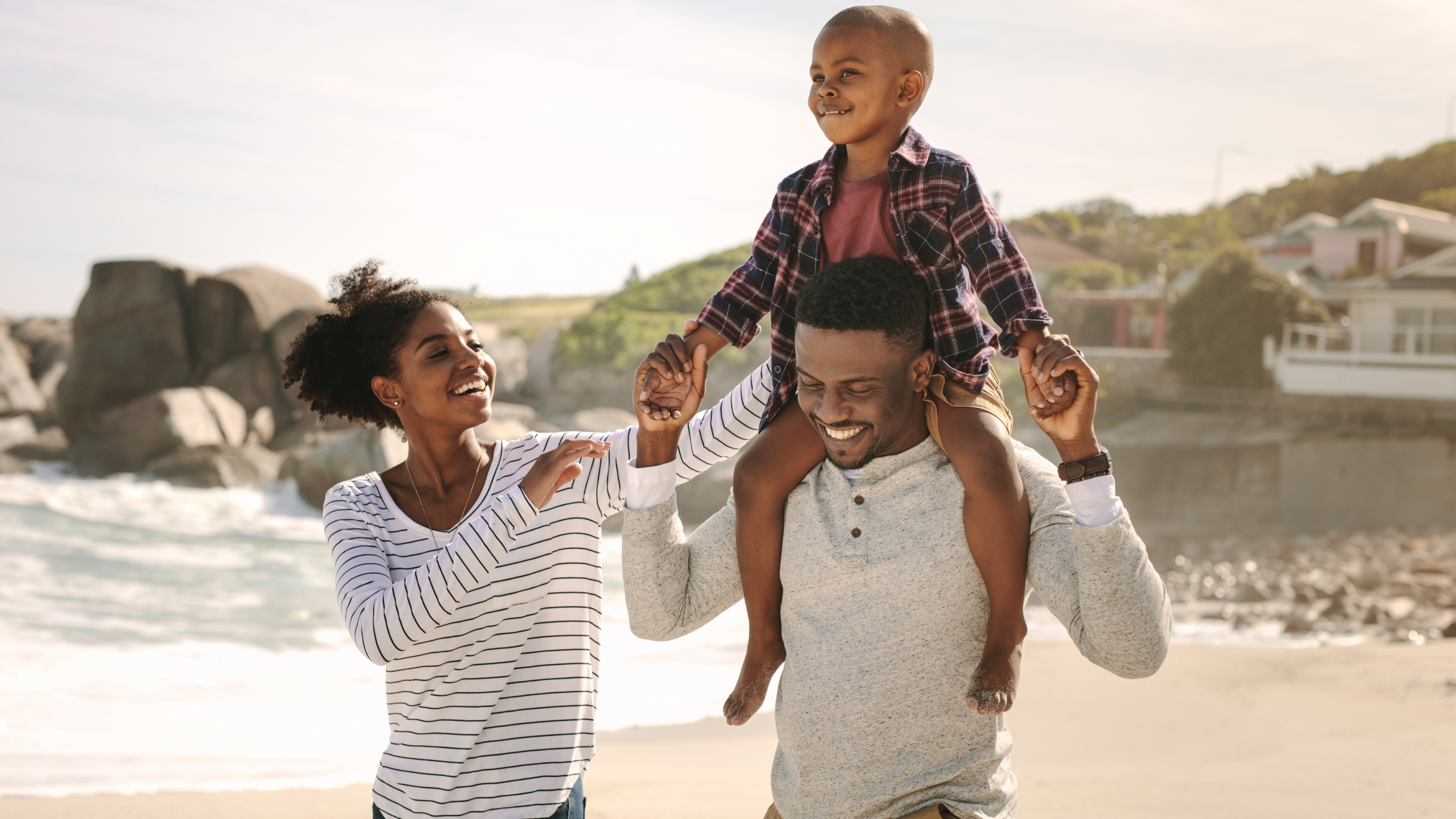 Family walking on the beach