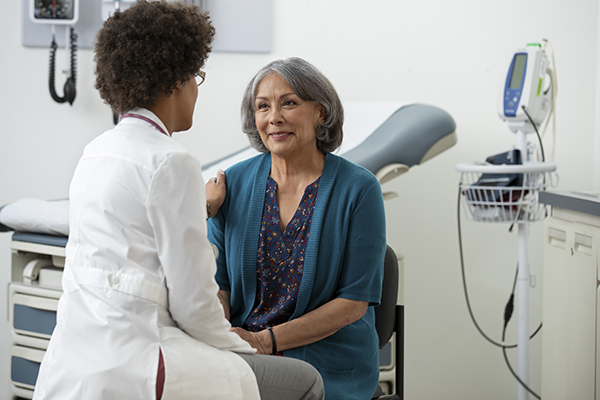 Woman meeting with a physician