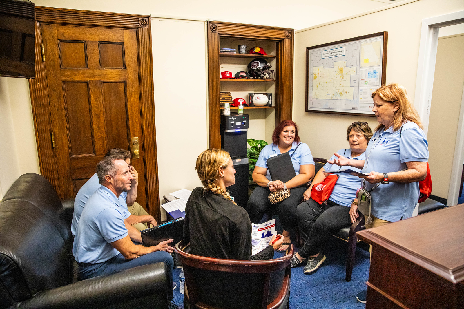 a group of MO volunteers meeting wtth congressional office