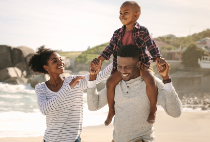 Family walking on the beach