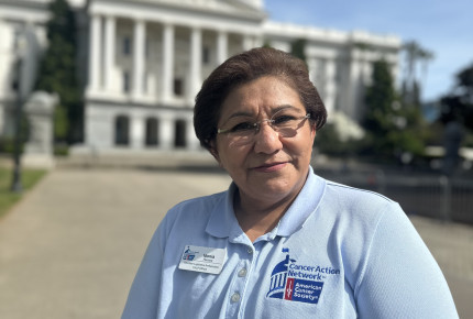 Idonia Ramos, breast cancer survivor, in front of the California Capitol