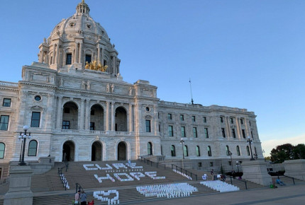 Hundreds of Lights of Hope bags are displayed on the steps of the Minnesota State Capitol