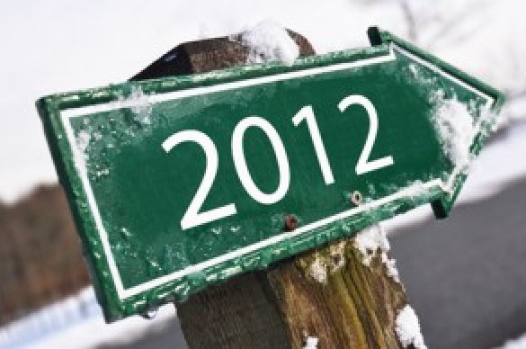 Green sign covered with snow