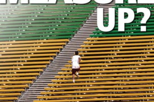 Man walking on sports bleachers