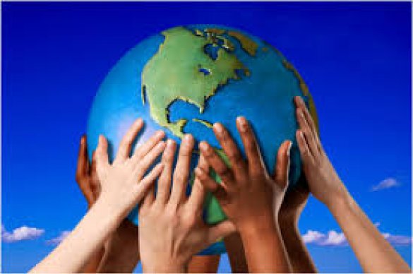 Children holding model globe