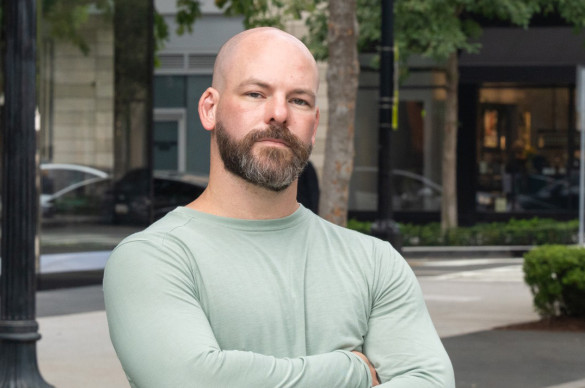 Ian serious expression arms crossed