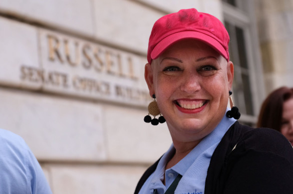 Volunteer with a pink had participating in Lobby Day