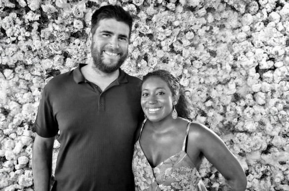 josh and partner smiling at camera_black and white