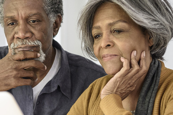 Couple looking at a computer