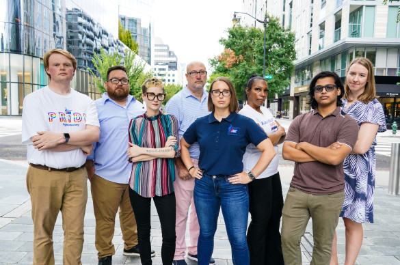 Volunteers in serious pose