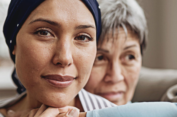 Woman with headscarf with her mother