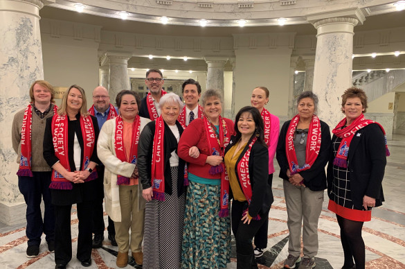Idaho volunteers in Idaho State Capitol rotunda wearing red scarves