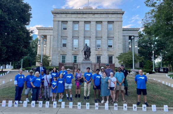 Group of volunteers outside NC State Capitol