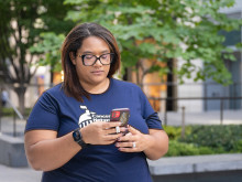 Volunteer using their phone
