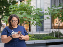 LSLD Volunteer looking down at phone