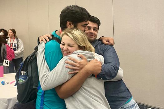 Young Leaders Summit participants hug