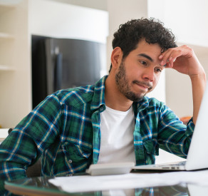 Man looking frustrated with his home finances