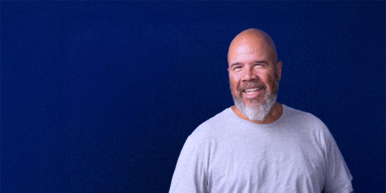 photo of miguel melendez with navy background