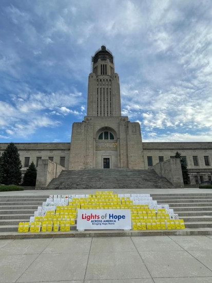 Lights of Hope bags are displayed on the steps of the Nebraska State Capitol