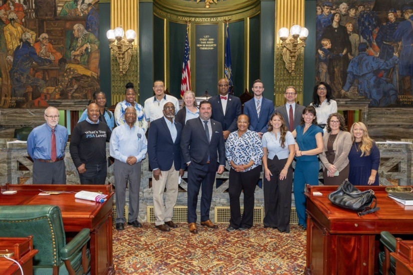 Group of advocates standing on the senate floor 