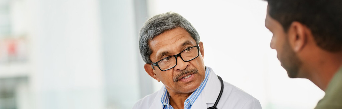 Doctor speaking with a patient
