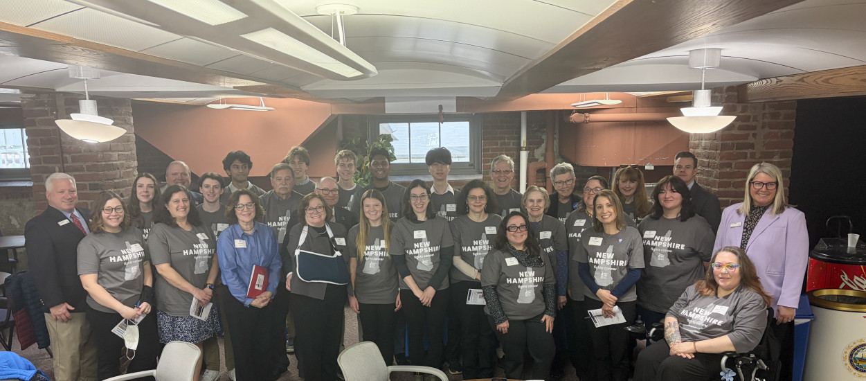 Group of 30 volunteers wearing New Hampshire Fights Cancer t-shirts