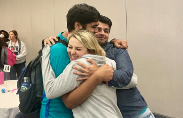 Young Leaders Summit participants hug